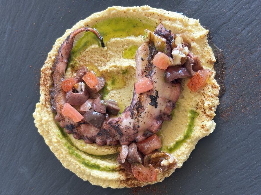 Grilled octopus on hummus